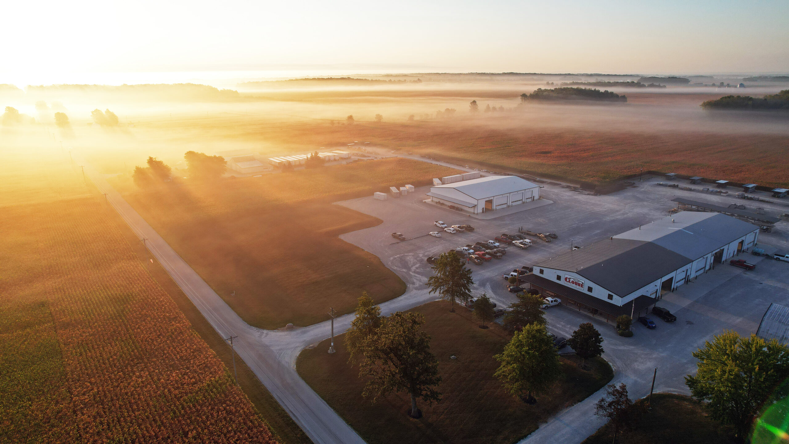 Sun setting over Clouse Headquarters and surrounding land.